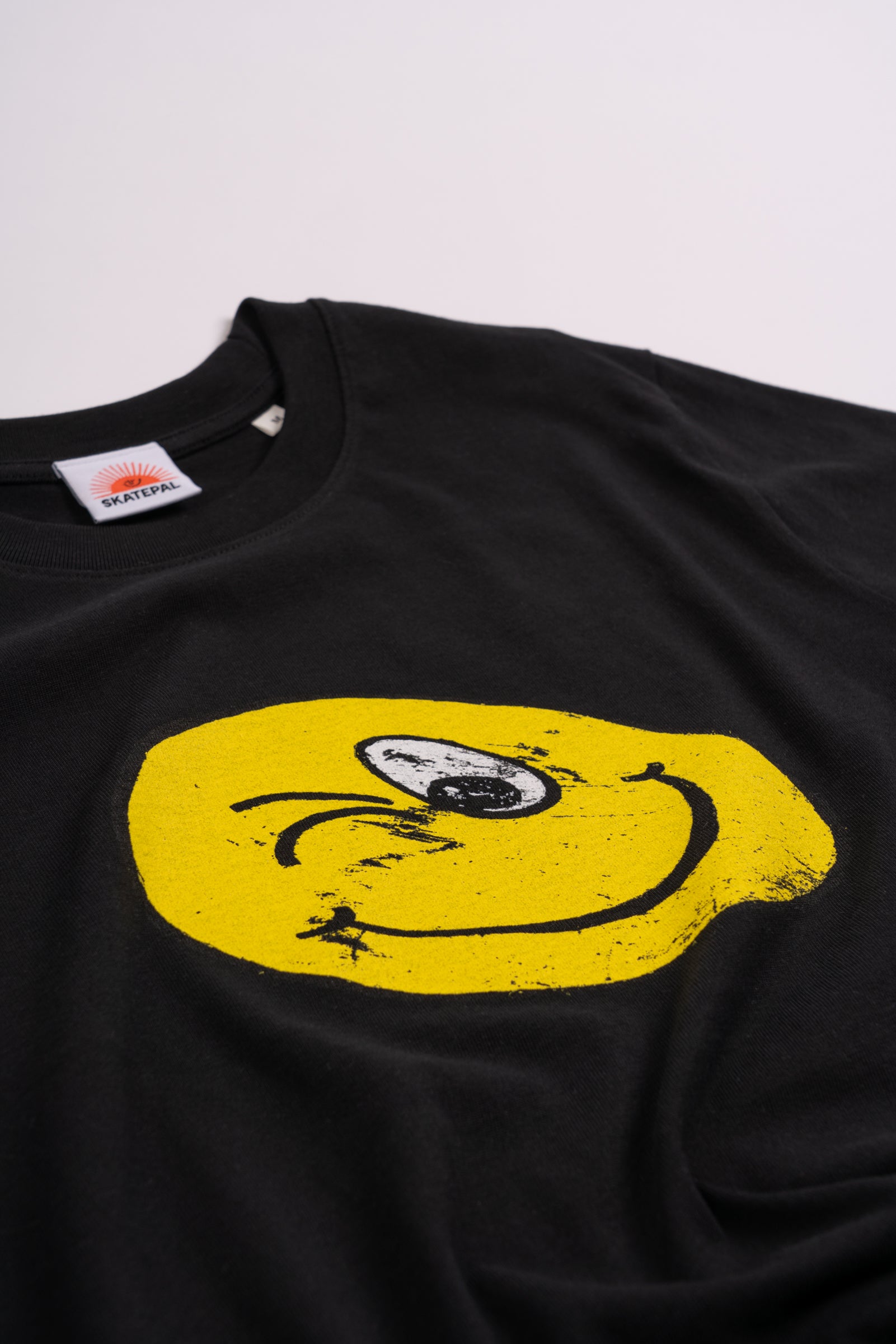 Asira10 'Wink' Tee